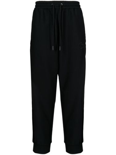 Pantalon de jogging fuselé à logo brodé - Giorgio Armani - Modalova