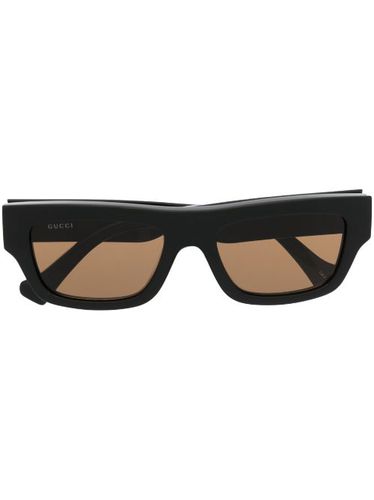 Lunettes de soleil teintées à monture carrée - Gucci Eyewear - Modalova