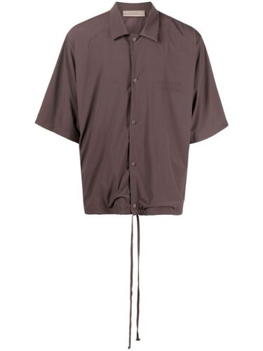 Polo à logo imprimé - FEAR OF GOD ESSENTIALS - Modalova