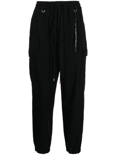 Pantalon cargo à logo brodé - Mastermind World - Modalova