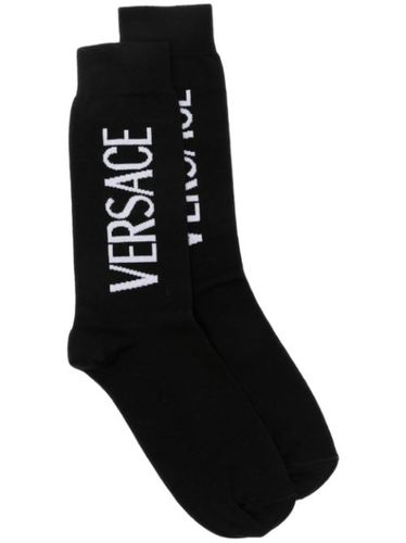 Chaussettes à logo en intarsia - Versace - Modalova