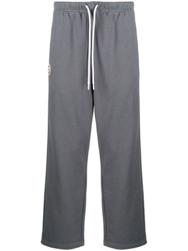 Pantalon de jogging droit à logo imprimé - AAPE BY *A BATHING APE® - Modalova