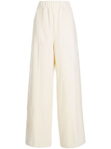 Pantalon évasé en velours à taille élastiquée - System - Modalova
