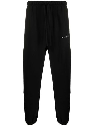 Pantalon de jogging en coton à logo imprimé - Ih Nom Uh Nit - Modalova