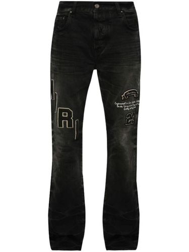 AMIRI jean à effet-usé - Noir - AMIRI - Modalova