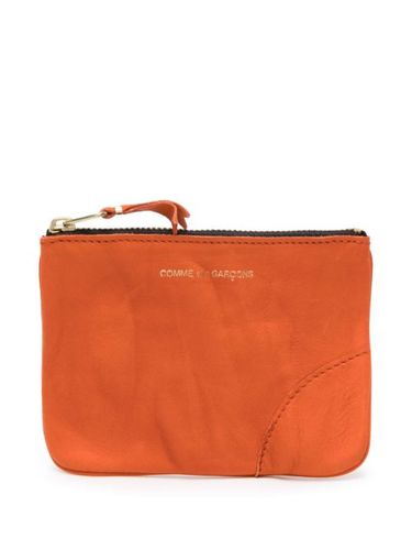 Pochette en cuir à fermeture zippée - Comme Des Garçons Wallet - Modalova