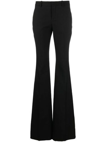 Pantalon évasé en laine à taille basse - Saint Laurent - Modalova