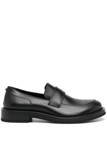 Mocassins en daim à logo embossé - Valentino Garavani - Modalova