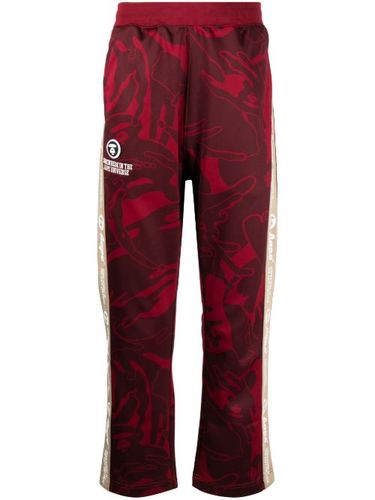 Pantalon à imprimé graphique - AAPE BY *A BATHING APE® - Modalova
