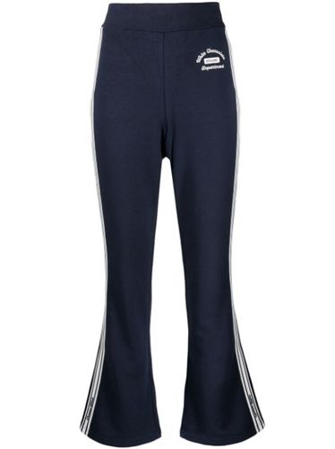 Pantalon de jogging à coupe évasée - CHOCOOLATE - Modalova