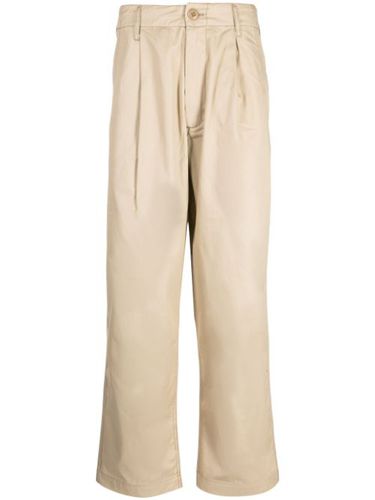 Pantalon fuselé à pinces - CHOCOOLATE - Modalova