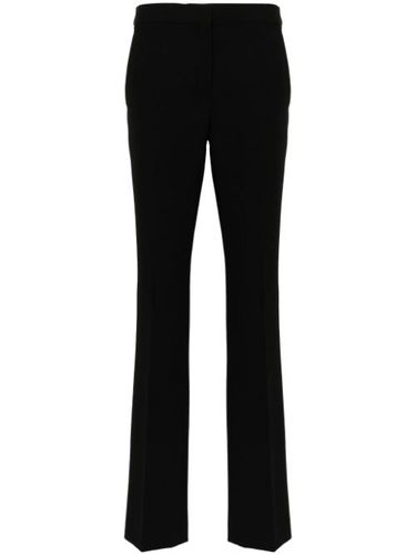 Pantalon droit à plis marqués - Moschino - Modalova