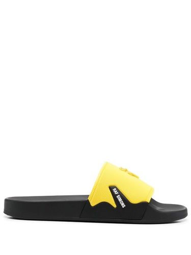 Claquettes à logo embossé - Raf Simons - Modalova