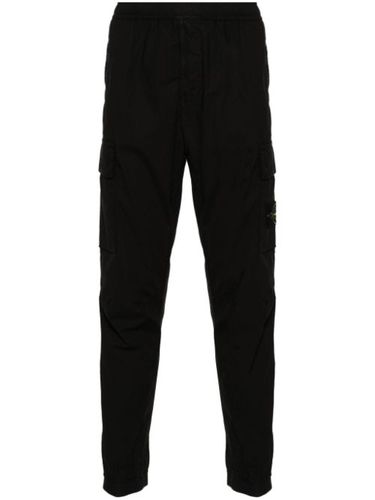 Pantalon fuselé à poches cargo - Stone Island - Modalova