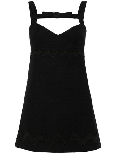 Patou robe courte en tweed - Noir - Patou - Modalova