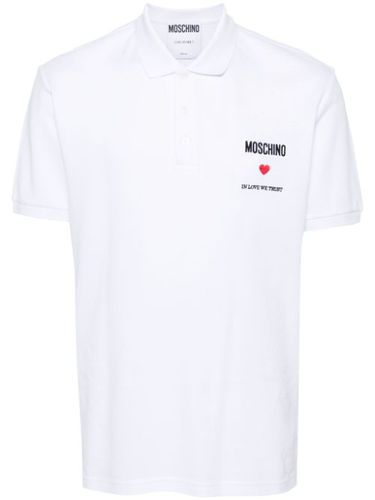 Polo à slogan brodé - Moschino - Modalova