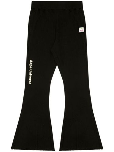 Pantalon nervuré à coupe évasée - AAPE BY *A BATHING APE® - Modalova