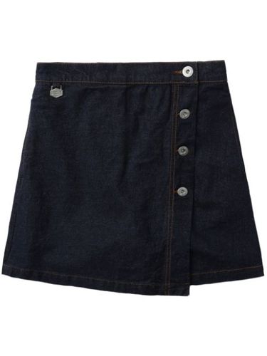 Short en jean à design portefeuille - CHOCOOLATE - Modalova