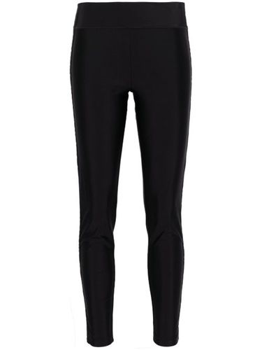 Legging en maille à logo en jacquard - Versace Jeans Couture - Modalova