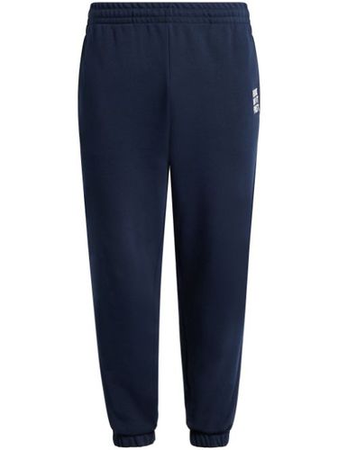 Pantalon de jogging à slogan brodé - Lacoste - Modalova