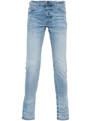 Jean Stack à coupe skinny - AMIRI - Modalova