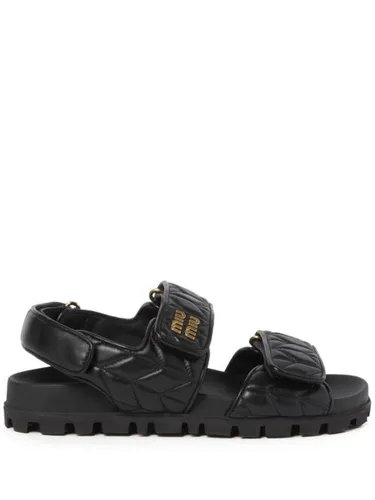 Sandales matelassées en cuir - Miu Miu - Modalova
