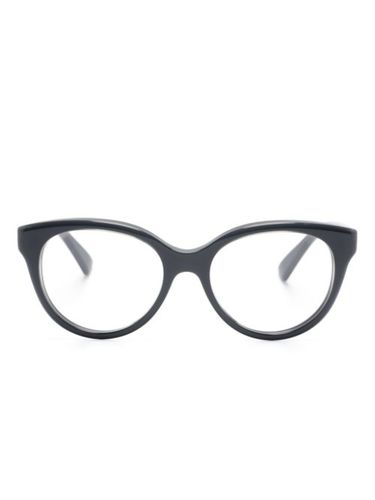 Lunettes de vue à monture ronde - Gucci Eyewear - Modalova