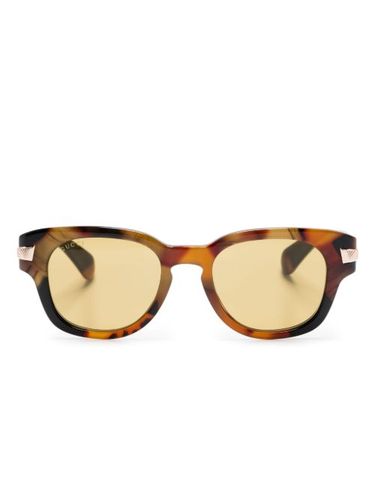Lunettes de soleil à monture ovale - Gucci Eyewear - Modalova