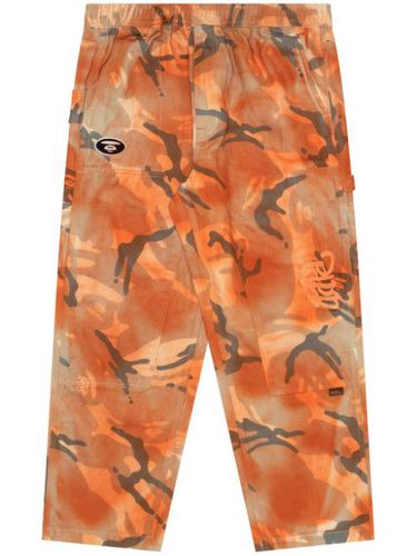 Pantalon à motif camouflage - AAPE BY *A BATHING APE® - Modalova