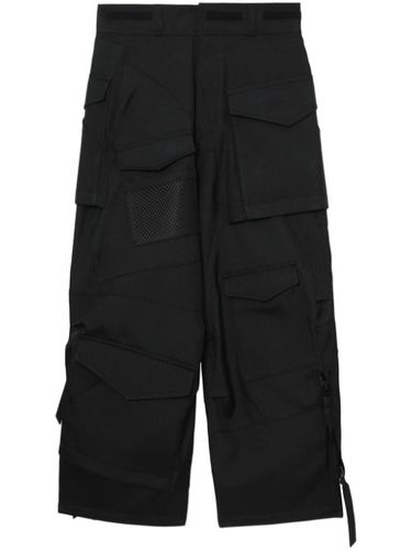 Pantalon cargo à sangles - Junya Watanabe MAN - Modalova