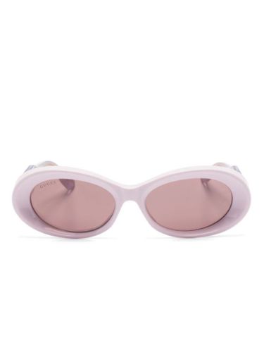 Lunettes de soleil à monture ovale - Gucci Eyewear - Modalova