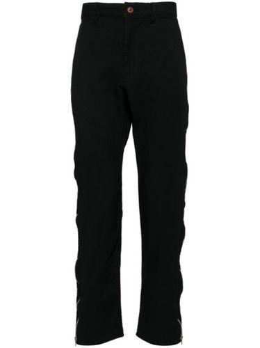 Pantalon fuselé à fermeture zippée - Black Comme Des Garçons - Modalova