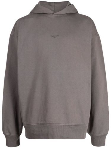 Hoodie en coton recyclé à logo imprimé - Holzweiler - Modalova