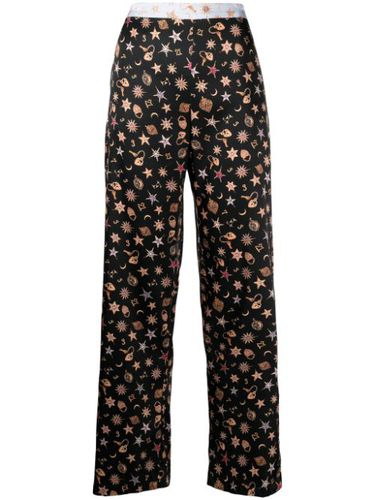 Pantalon en satin à imprimé Charm - Fleur Du Mal - Modalova