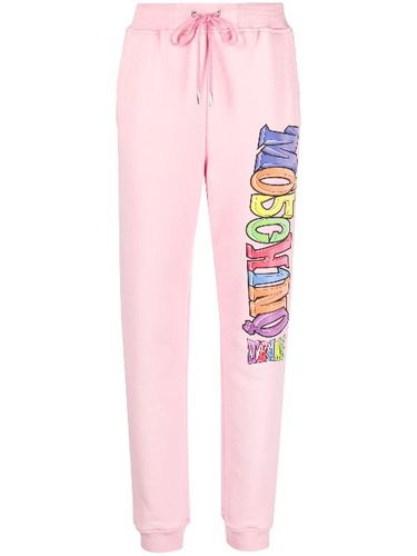 Pantalon de jogging en coton à logo imprimé - MOSCHINO JEANS - Modalova