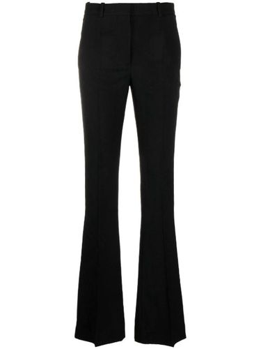 Pantalon évasé à motif baroque en jacquard - Versace - Modalova