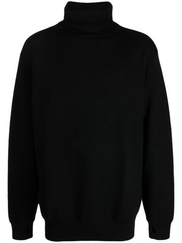 Pull en laine mérinos à col roulé - Maharishi - Modalova
