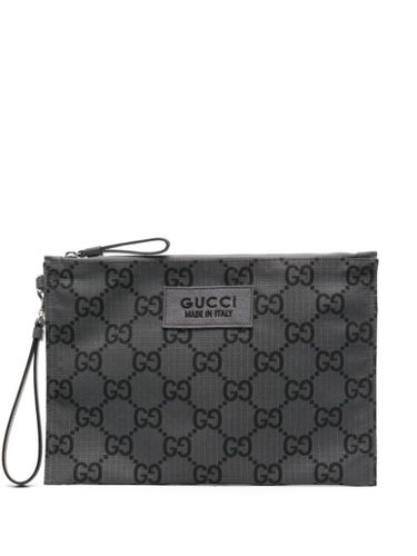 Gucci pochette à motif GG - Gris - Gucci - Modalova