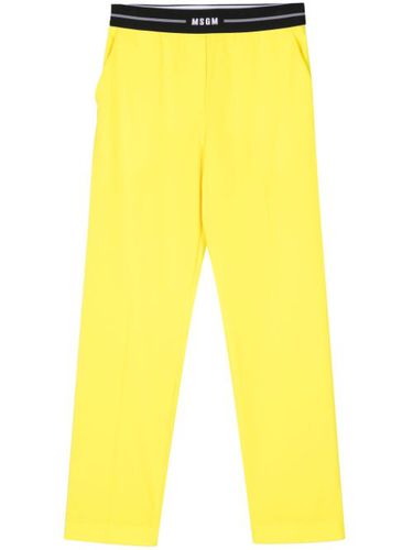 Pantalon en laine vierge à coupe fuselée - MSGM - Modalova