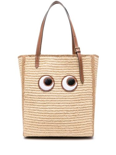 Panier Eyes en raphia tressé - Anya Hindmarch - Modalova