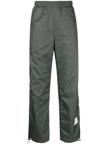 Transparent pantalon de jogging à patch logo - Thom Browne - Modalova