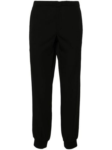 Pantalon fuselé à lien de resserrage - Prada - Modalova