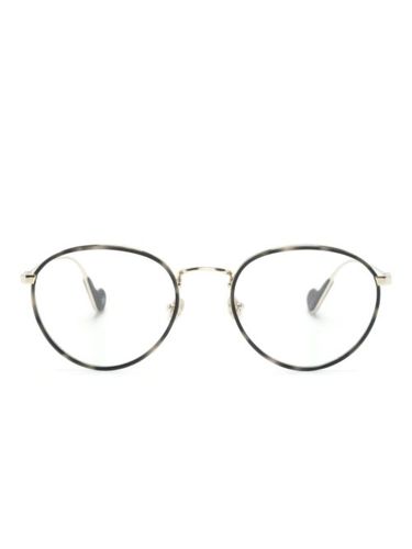 Lunettes de vue à monture ronde - Moncler Eyewear - Modalova