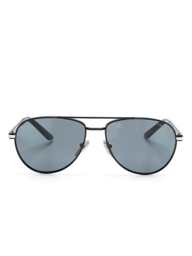 Lunettes de soleil à logo imprimé - Prada Eyewear - Modalova