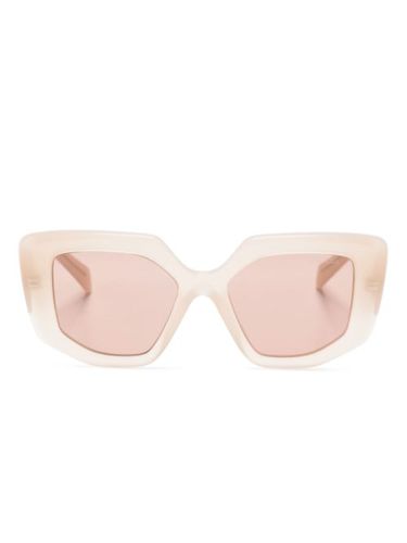 Lunettes de soleil à monture géométrique - Prada Eyewear - Modalova