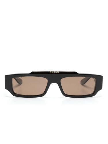 Lunettes de soleil rectangulaires à logo - Gucci Eyewear - Modalova