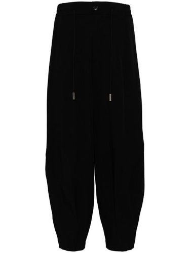 Pantalon sarouel à lien de resserrage - SONGZIO - Modalova