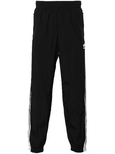 Pantalon de jogging à trèfle brodé - adidas - Modalova