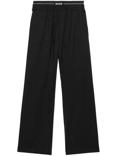 Pantalon à taille à logo - MSGM - Modalova