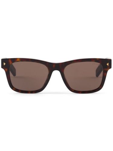 Lunettes de soleil à effet écailles de tortue - Prada Eyewear - Modalova